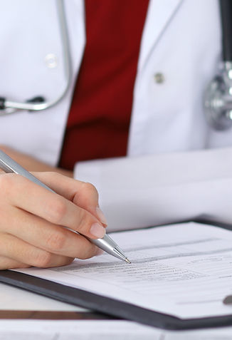 Doctor writing notes