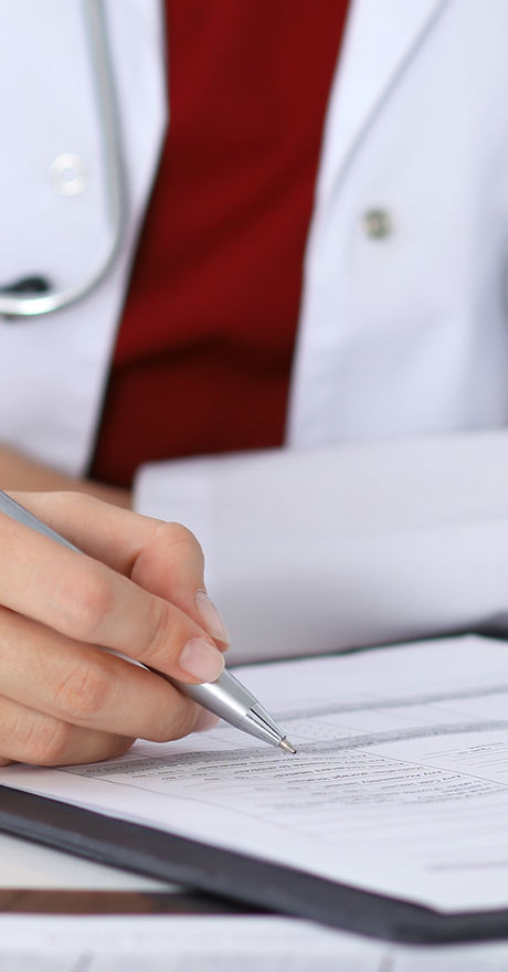 Doctor Checking a Form