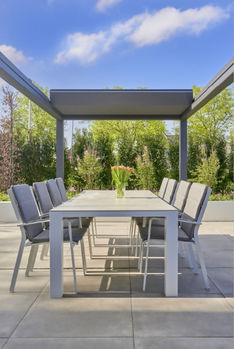 Aluminium veranda with a table
