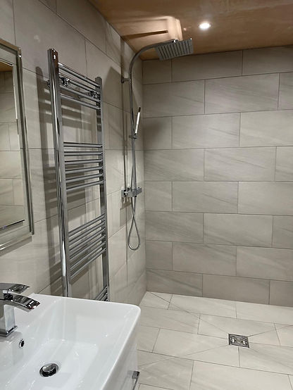 Grey shower in a bathroom