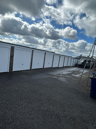 Line of white garage doors