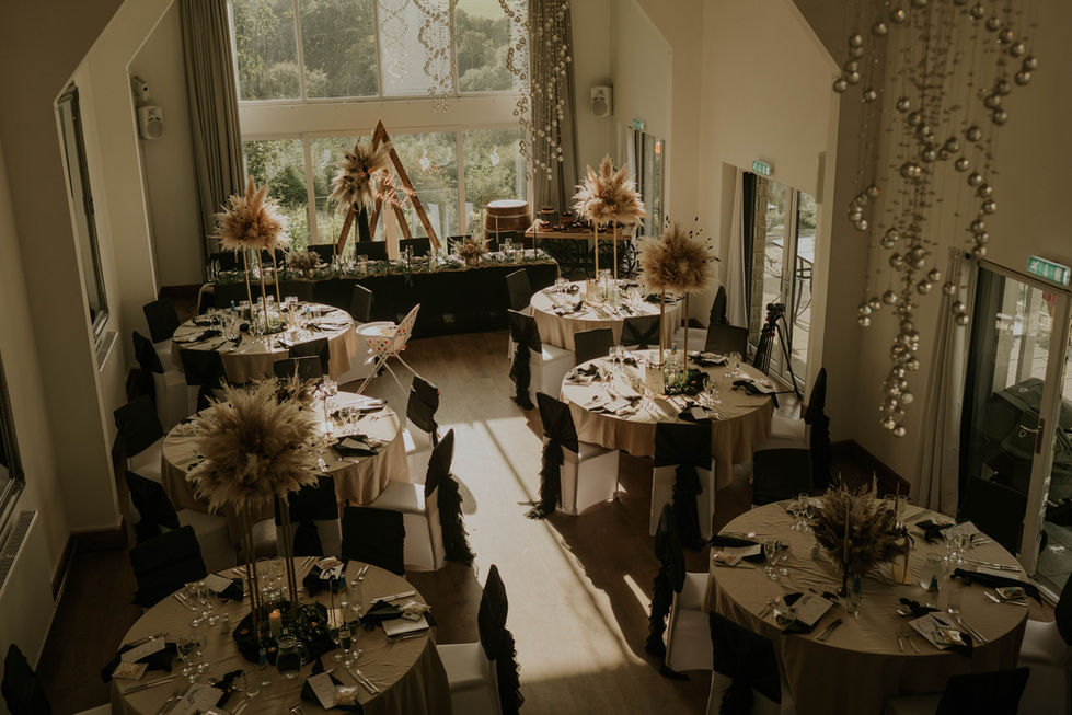 Seamless blend of luxury and elegance, featuring exquisite tablescapes, captivating floral designs, and an enchanting candlelit ambiance