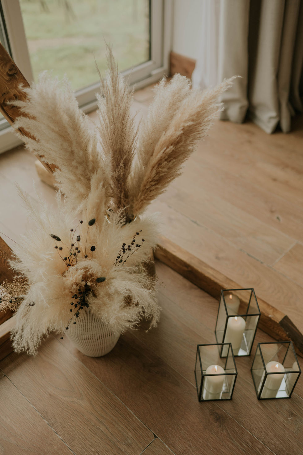 Soft, earthy florals, romantic lighting, and statement decor elements.