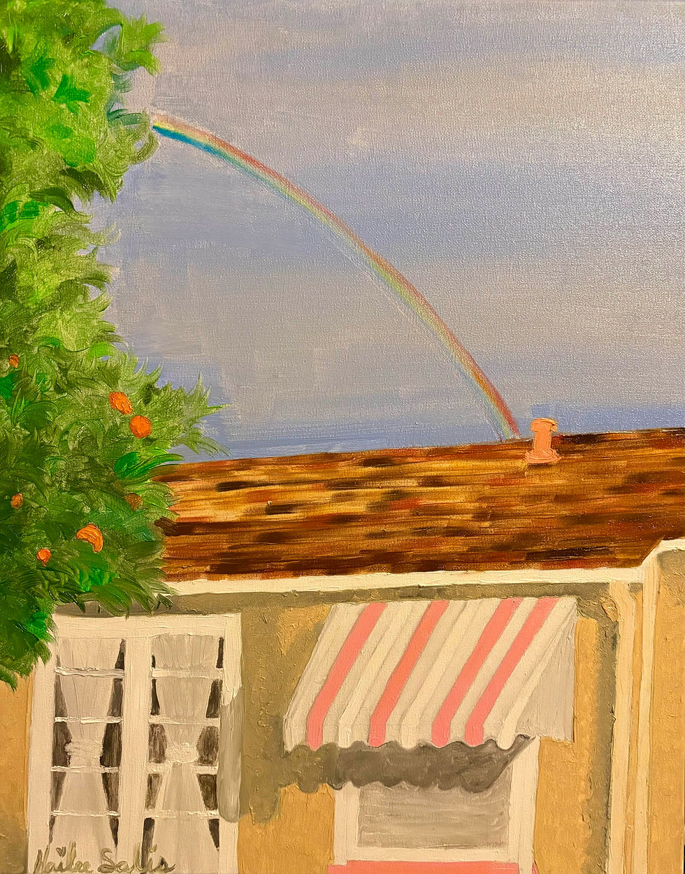 backyard image of small home in San Leandro, California featuring a rainbow demonstrating a unique experience after a funeral