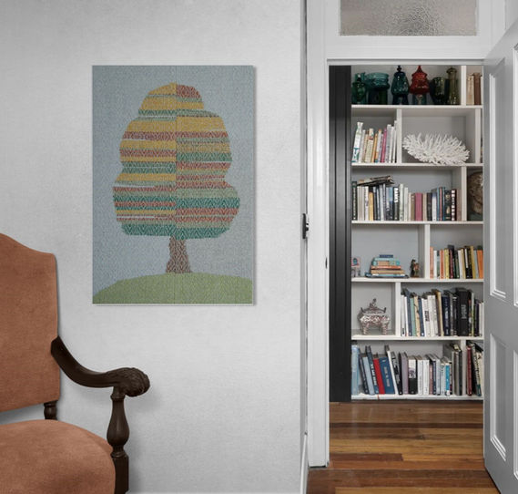 handwoven textile wall art of autumn trees. woven pattern