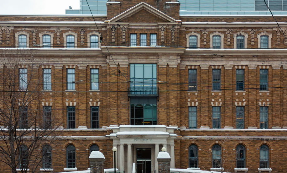 Historic brick building with snow