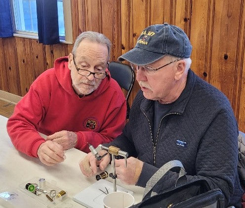 New Vet Bill on right guided by Vol, Brian