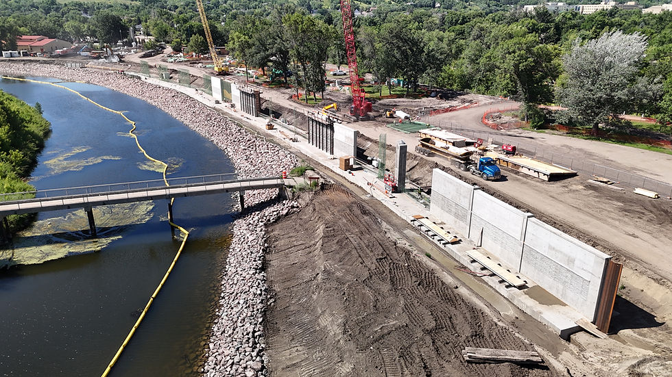 Flood wall footing and flood wall panels being placed on the east side of Roosevelt Park.