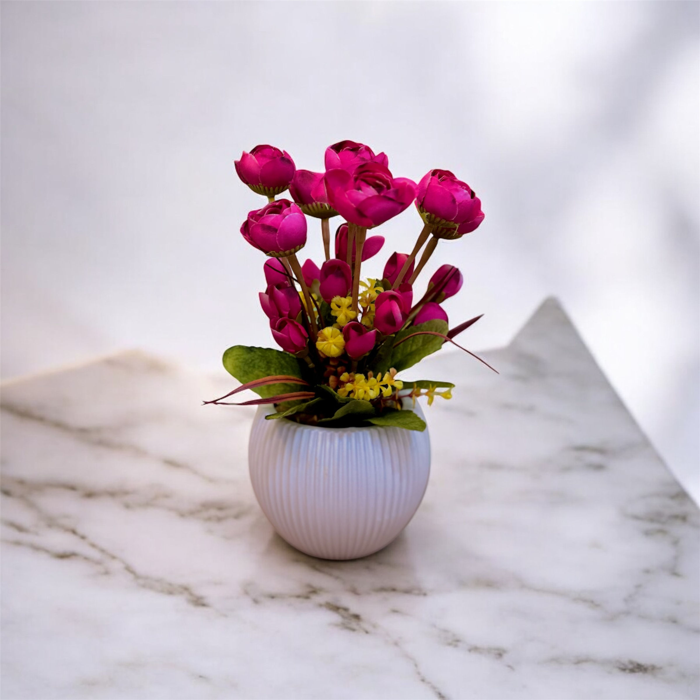 Artificial Pink Ranunculus and Yellow Flower Arrangement in Decorative Pot