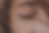 Closed eye with freckles and red hair