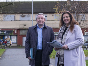 David Ross, chief executive officer of Glasgow Credit Union and Susan Aktemel outside the Broomton Road development