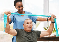 Senior with Physical Therapist