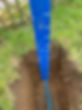 Large blue ruler showing measurement depth of water pipe