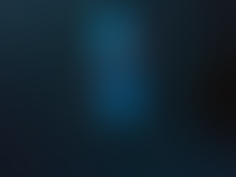 aerial view of blue kayak and person paddling