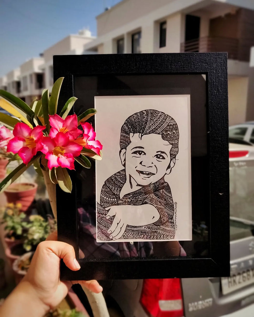 Personalized portrait surrounded by hand-drawn Mandala designs