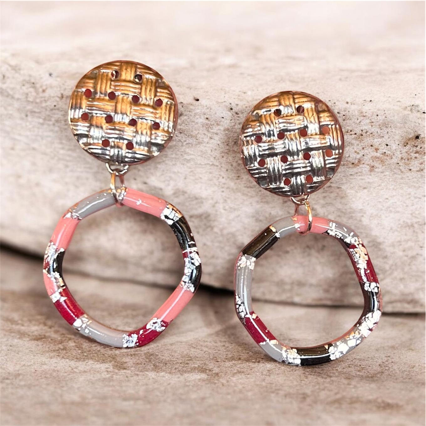 Irregular circle dangle with large silver button-like stud