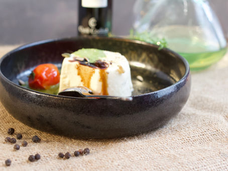 Parmesan panna cotta with pesto and roasted tomatoes