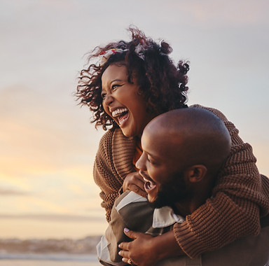 Black couple, travel and beach fun while Perna Perna Umdloti - Pearl of Umdloti