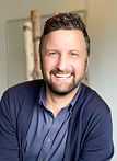 This smiling man could be craving connection.