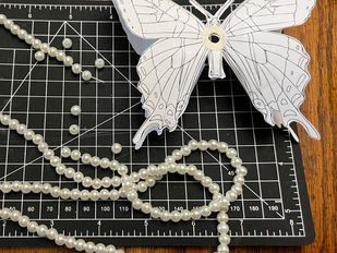 Art Project Preparation Swallowtail Butterfly Digital Download with Hole Punch, String, and Recycled Costume Jewelry to Make an Ornament, Las Vegas, NV November 2025