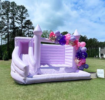 Little Bounce Company bounce house rental with balloon decor at a kids party in Raleigh NC