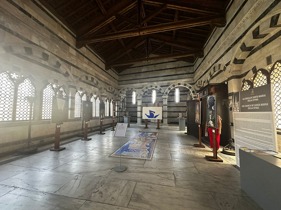 interior of Santa Maria della Spina during Luca Macchi's exhibition La Zattera dell'arte e della poesia