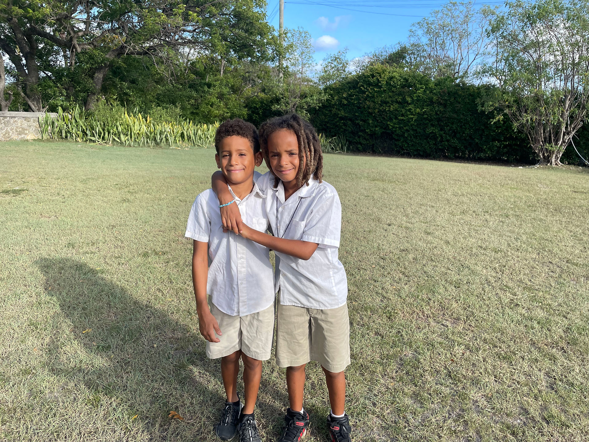 Two brothers smiling. 