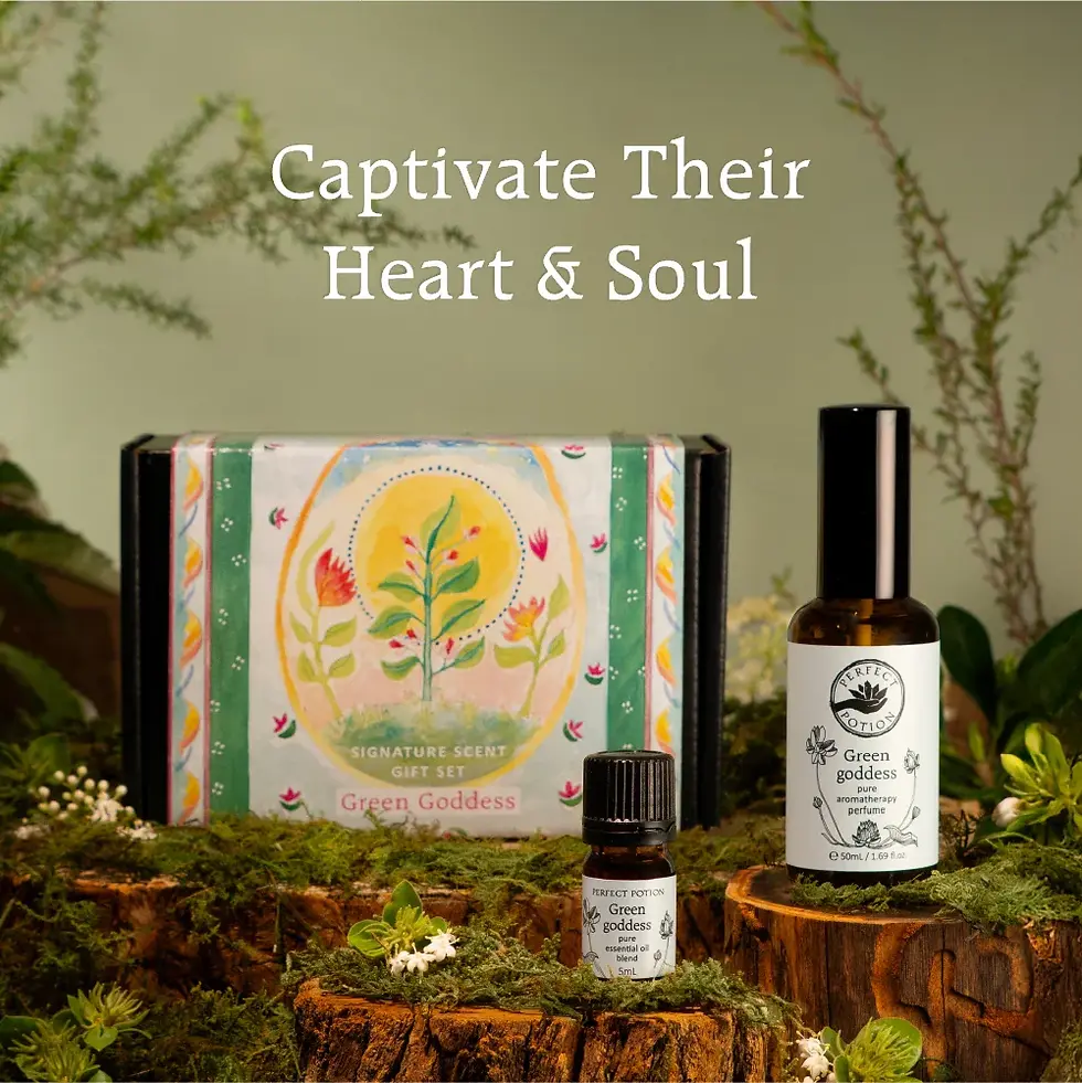 Green Goddess perfume and essential oil gift set amongst moss and leaves
