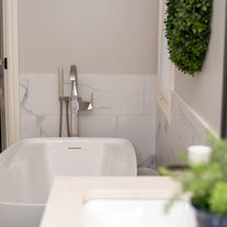 Freestanding tub bathroom design with modern finishes Wichita KS
