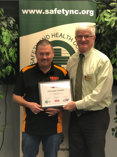 Chris Kindley, being presented his MESH Certificate