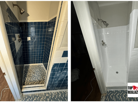 Dark blue shower wall tile reglazed white while the original shower tile and mosaic floor remain in place.