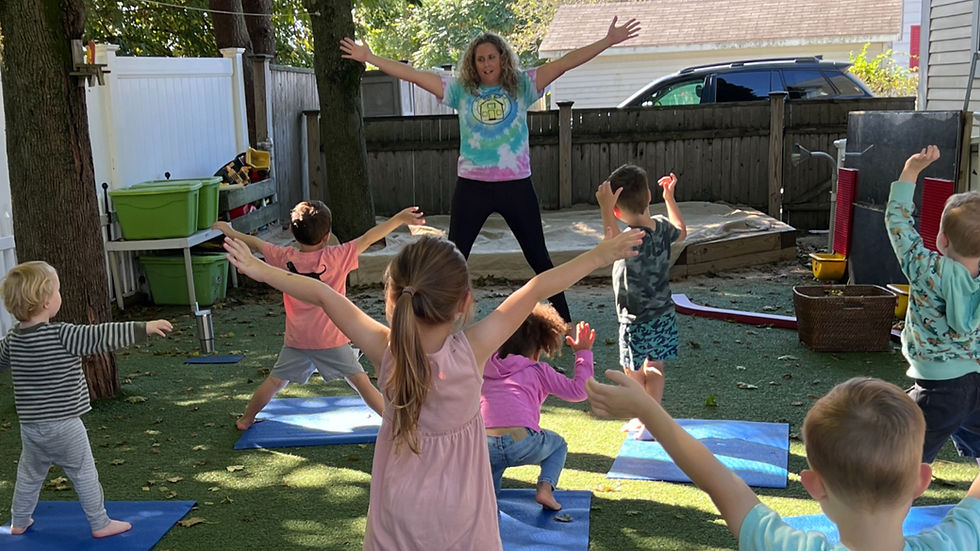 Ms Erin teaching yoga to preschool aged children at the Fox Hill School in Danvers