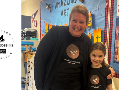 Glen Robbins Innovation in Education award with North Kitsap Schools Foundation logo and a bird sitting on a book. A photo is next to the logo of: Heather blue smiling with a child in matching shirts stand in a classroom.
