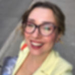 Veronica, the coach and founder, smiling
