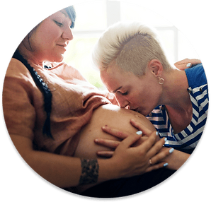 Two women lesbian couple expencting a baby