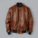 a classic leather bomber jacket showing some age against a medium grey background.jpg