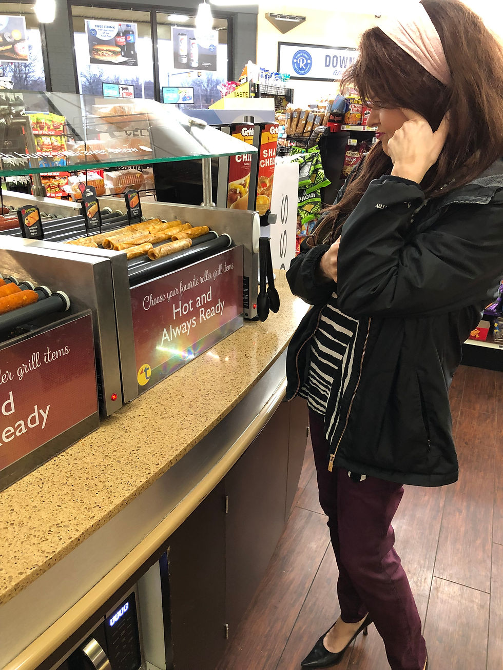 Lerlene staring at the tamales trying to decide which one she wants.