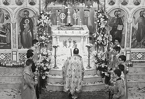 Rev. Fr. Phillip Zymaris and Altar boys.