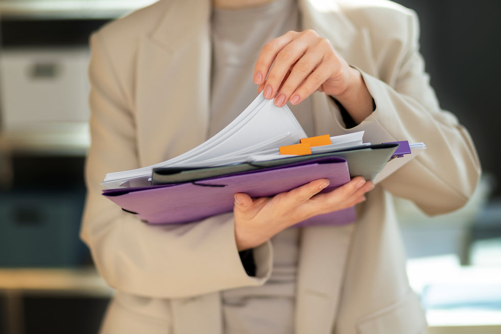 young-adult-organizing-documents.jpg