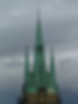 Kirchturm mit grüner Patina – Denkmalpflege durch Seilzugangstechnik
