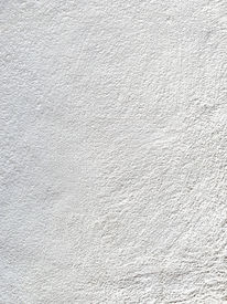 Mineralischer Bio-Edelputz aus Kalk und natürlichen Gesteinskörnungen mit feiner Struktur. Diffusionsoffene, ökologische Wand- und Fassadenoberfläche.