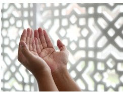 Hands in prayer representing the spiritual teachings and deeper meaning of the Lord's Prayer.