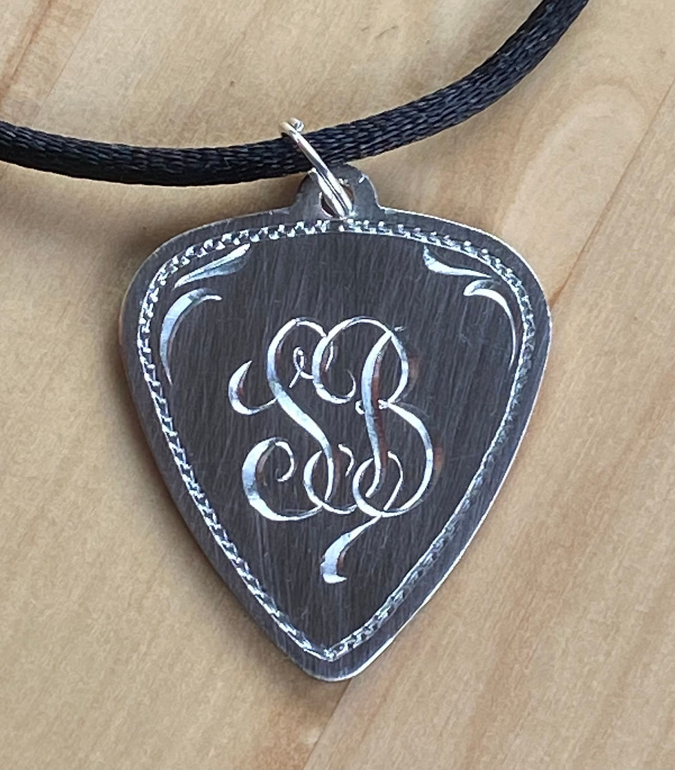 Thumbnail: Custom Engraved Pendants, Pins, and Pocket Pieces