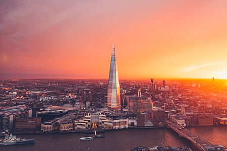 London skyline at sunset with The Shard in focus – backdrop for property insights and market intelligence