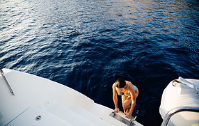 private-catamaran-woman-swimming.jpg