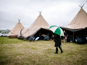 A Rustic Farm Wedding in Rural Aberdeenshire During an Amber Weather Warning, with Tipis, a Hog Roast and Chicken Racing