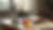 Eye-level view of a cozy home workspace with a laptop and herbal tea