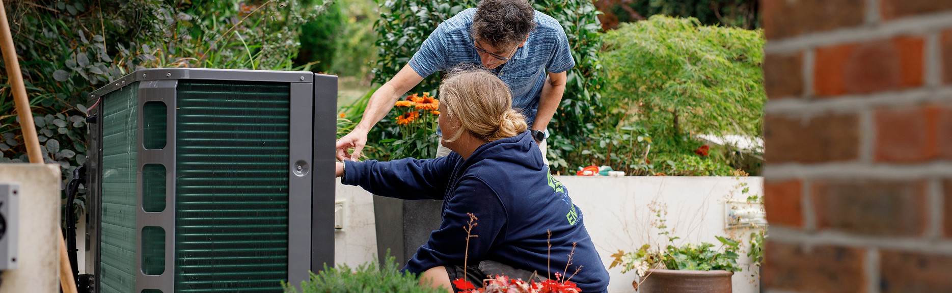 Your Energy Your Way Heat Pump Engineer servicing a heat pump