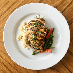 Grilled Chicken over Coconut-Lemongrass Scented Rice with Coconut-Passionfruit Sauce