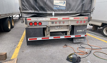 New taillight bracket with new taillights and new bumper after repair.